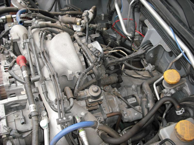 Illustration for article titled Garage Mechanic Ghetto-Rigs Subaru Impreza With Eaton Supercharger